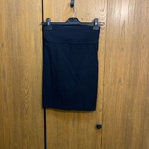 Mad rag black spandex skirt size small with bow in the back split